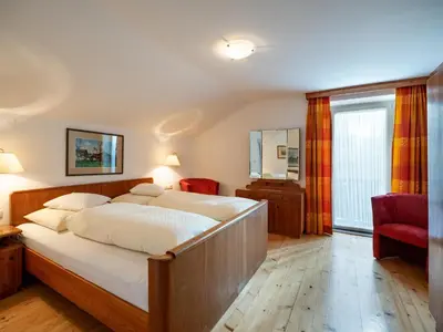Ein Bett oder Betten in einem Zimmer der Unterkunft Ferienhaus Friedenau