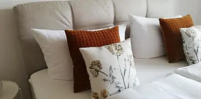 Ein Bett oder Betten in einem Zimmer der Unterkunft Haus TIROL