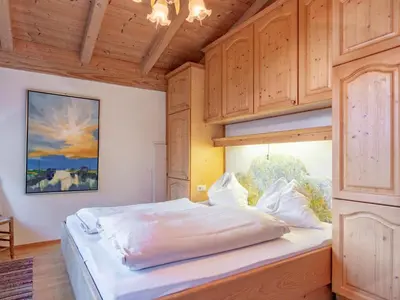 Ein Bett oder Betten in einem Zimmer der Unterkunft Hochkönig