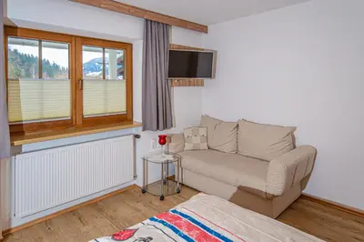 Ein Sitzbereich in der Unterkunft Landhaus Exenberger / Ferienwohnung Smaragd