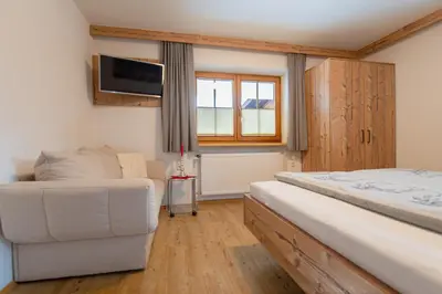 Ein Bett oder Betten in einem Zimmer der Unterkunft Landhaus Exenberger / Ferienwohnung Smaragd