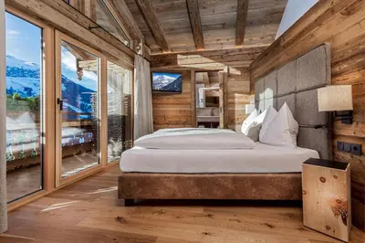 Ein Bett oder Betten in einem Zimmer der Unterkunft Schönwieshütte