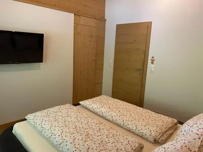 Ein Bett oder Betten in einem Zimmer der Unterkunft Sunside Apartment