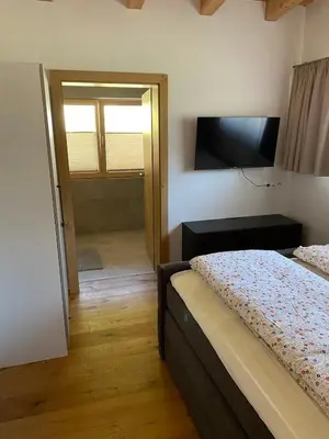 Ein Bett oder Betten in einem Zimmer der Unterkunft Sunside Apartment