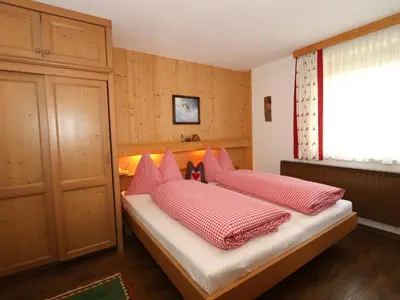Ein Bett oder Betten in einem Zimmer der Unterkunft Huber