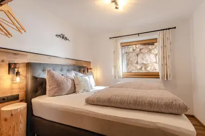 Ein Bett oder Betten in einem Zimmer der Unterkunft Leitenhof Fam.Steger