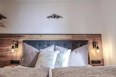Ein Bett oder Betten in einem Zimmer der Unterkunft Leitenhof Fam.Steger