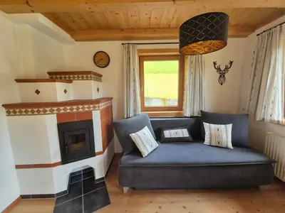 Ein Sitzbereich in der Unterkunft Chalet Romana