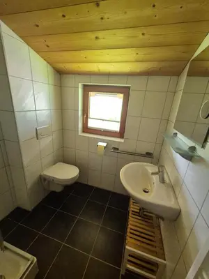 Ein Badezimmer in der Unterkunft Chalet Romana