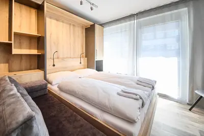 Ein Bett oder Betten in einem Zimmer der Unterkunft Appartement Bittner