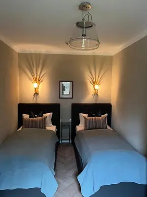 Ein Bett oder Betten in einem Zimmer der Unterkunft Ferienapartment Residenz 