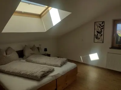 Ein Bett oder Betten in einem Zimmer der Unterkunft Jochelerhof