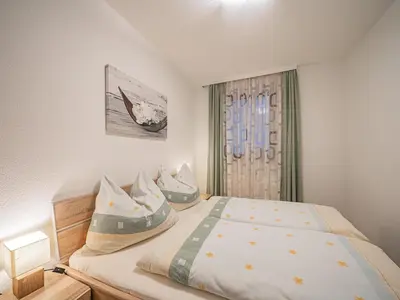 Ein Bett oder Betten in einem Zimmer der Unterkunft Kapeller