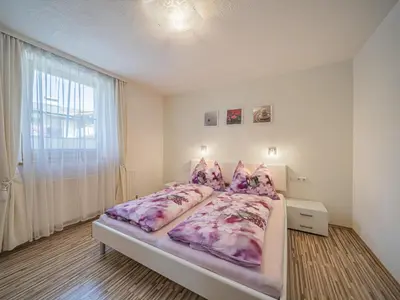 Ein Bett oder Betten in einem Zimmer der Unterkunft Kapeller