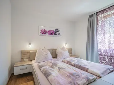 Ein Bett oder Betten in einem Zimmer der Unterkunft Kapeller