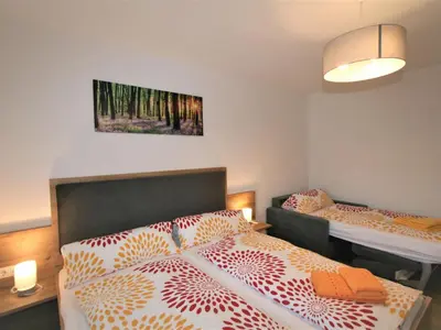 Ein Bett oder Betten in einem Zimmer der Unterkunft Apartment Mäuerl by Interhome