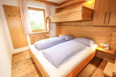 Ein Bett oder Betten in einem Zimmer der Unterkunft Ferienwohnung 77 - Top 36