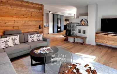 Ein Sitzbereich in der Unterkunft BOUTIQUE KAISERLODGE mit privater SAUNA & WHIRLPOOL by Belle Stay