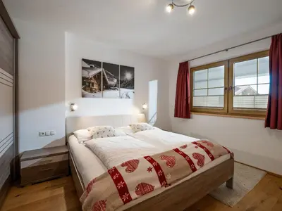 Ein Bett oder Betten in einem Zimmer der Unterkunft Frangl by Apartment Managers