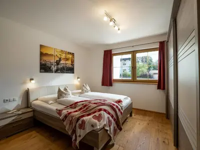 Ein Bett oder Betten in einem Zimmer der Unterkunft Frangl by Apartment Managers