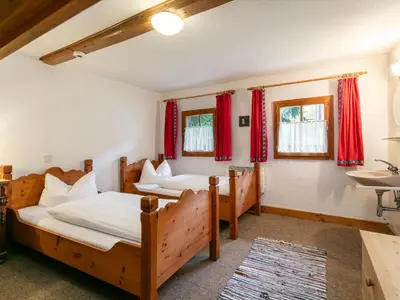 Ein Bett oder Betten in einem Zimmer der Unterkunft Alpin Hideaway XL