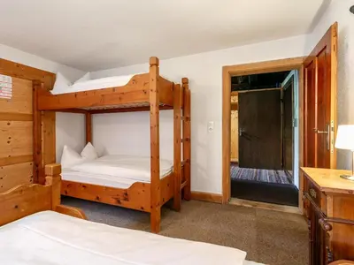 Ein Bett oder Betten in einem Zimmer der Unterkunft Alpin Hideaway XL