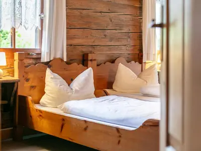 Ein Bett oder Betten in einem Zimmer der Unterkunft Alpin Hideaway XL
