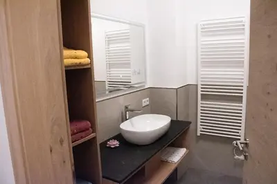 Ein Badezimmer in der Unterkunft Das Gschossmann