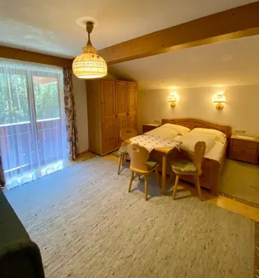 Ein Sitzbereich in der Unterkunft Appartements Hollaus