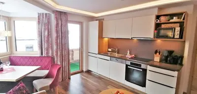 Küche/Küchenzeile in der Unterkunft Heimat Apartments - Zillertal
