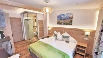 Ein Bett oder Betten in einem Zimmer der Unterkunft Heimat Apartments - Zillertal