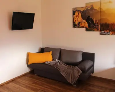 Ein Sitzbereich in der Unterkunft Apart Sunny Side