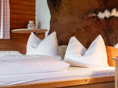 Ein Bett oder Betten in einem Zimmer der Unterkunft Alpin Hideaway L