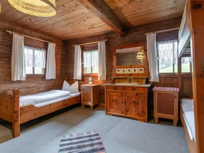 Ein Bett oder Betten in einem Zimmer der Unterkunft Alpin Hideaway L