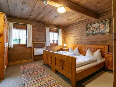 Ein Bett oder Betten in einem Zimmer der Unterkunft Alpin Hideaway L