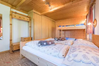 Ein Bett oder Betten in einem Zimmer der Unterkunft Almliesl HOLL-154