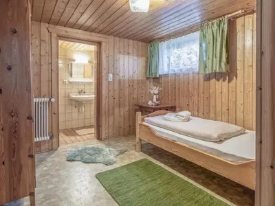 Ein Bett oder Betten in einem Zimmer der Unterkunft Platzhirsch