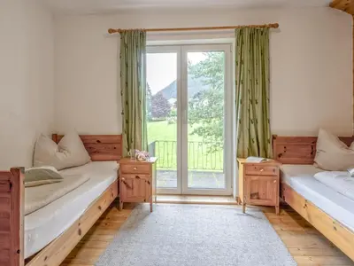 Ein Bett oder Betten in einem Zimmer der Unterkunft Platzhirsch