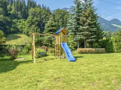 Ein Kinderspielbereich in der Unterkunft Platzhirsch