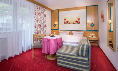 Ein Bett oder Betten in einem Zimmer der Unterkunft Landhaus Tipotsch