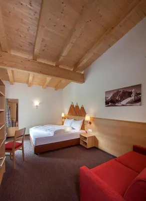 Ein Bett oder Betten in einem Zimmer der Unterkunft Alpen-Apart