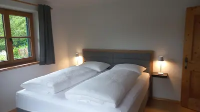 Ein Bett oder Betten in einem Zimmer der Unterkunft Ferienbauernhof Stallhäusl