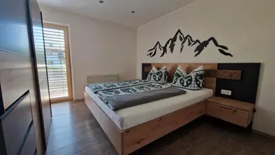 Ein Bett oder Betten in einem Zimmer der Unterkunft Ferienwohnung Bergzauber
