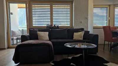 Ein Sitzbereich in der Unterkunft Ferienwohnung Bergzauber