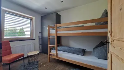 Ein Bett oder Betten in einem Zimmer der Unterkunft Ferienwohnung Bergzauber