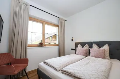 Ein Bett oder Betten in einem Zimmer der Unterkunft Apartment Alpbachtraum