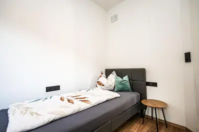 Ein Bett oder Betten in einem Zimmer der Unterkunft Apartment Alpbachtraum