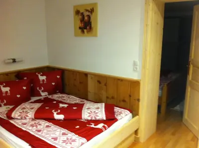 Ein Bett oder Betten in einem Zimmer der Unterkunft Migglwieshof