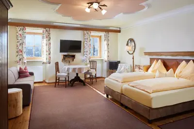 Ein Bett oder Betten in einem Zimmer der Unterkunft Pension Oberbräu