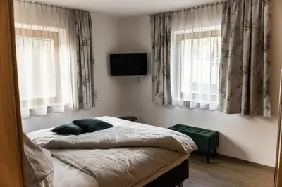 Ein Bett oder Betten in einem Zimmer der Unterkunft Appartement Monika